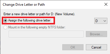In the new dialog box, select the Assign the following drive letter drop-down